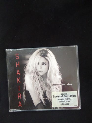 Shakira underneath your - -,
