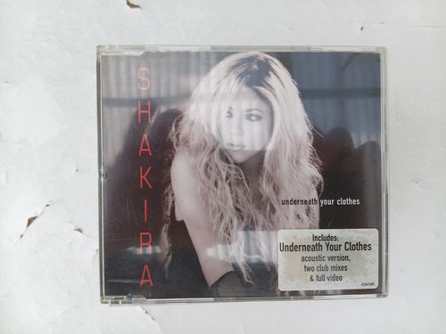 Shakira underneath your - cd,,